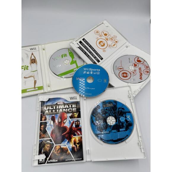 Nintendo Wii Game Lot of 4 Wii Fit Wii Play Marvel Ultimate Alliance Wii Sports